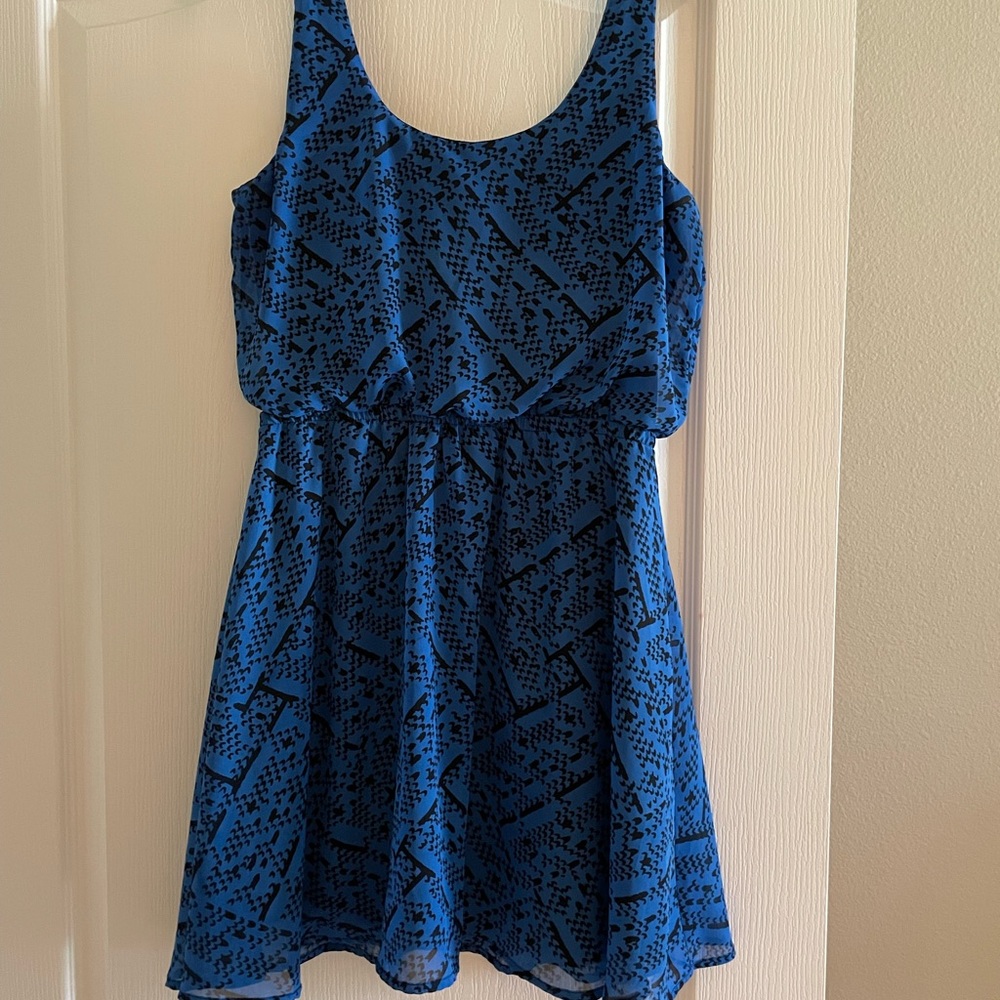 Midi A-line blue and black doubled line dress.